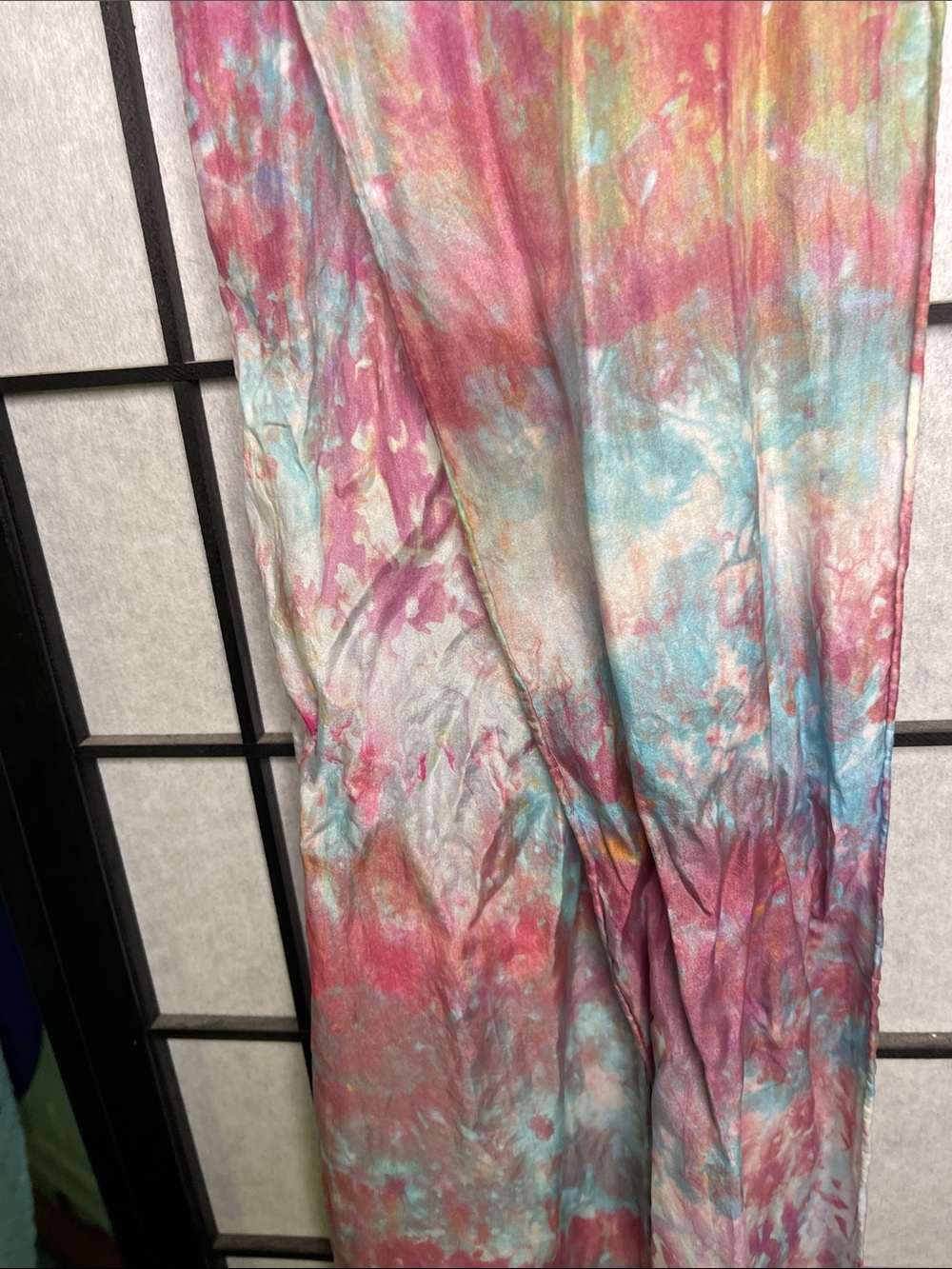 SILK Soft color with smooth muted tones describe this scarf.